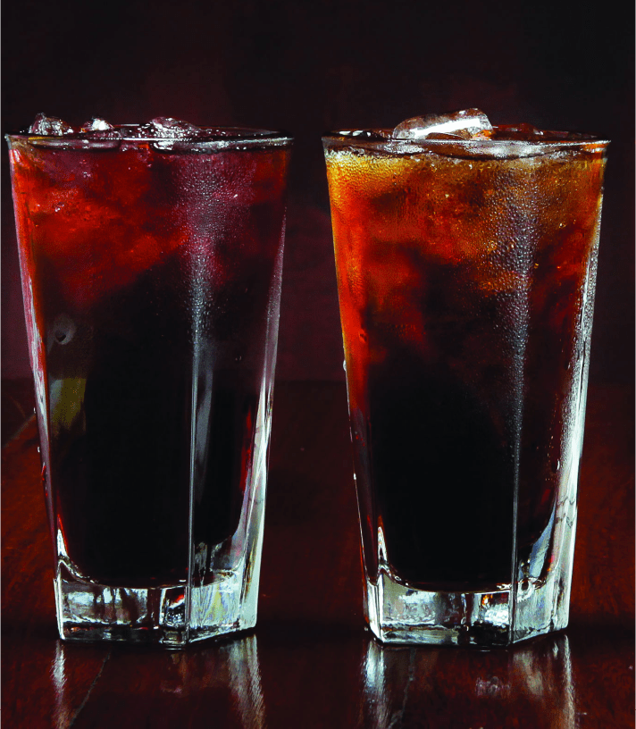 Two Glasses OF Cocktail Along With Ice