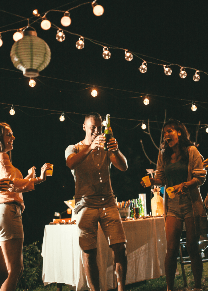 A man along with two girls having party