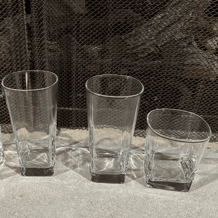 Three empty glasses kept on a table