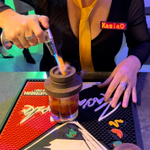 A Smoker Lighting a Pot of Material on the table